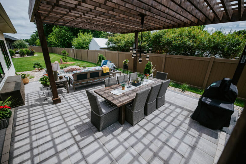backyard dining area with patio and pergola