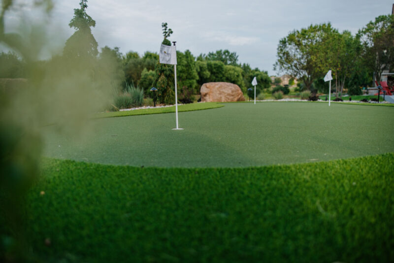 backyard putting green installed by Weller Brothers Landscape Professionals