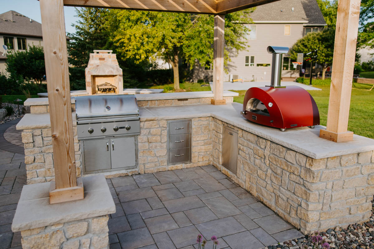 outdoor kitchen will grill and pizza oven in rochester, mn