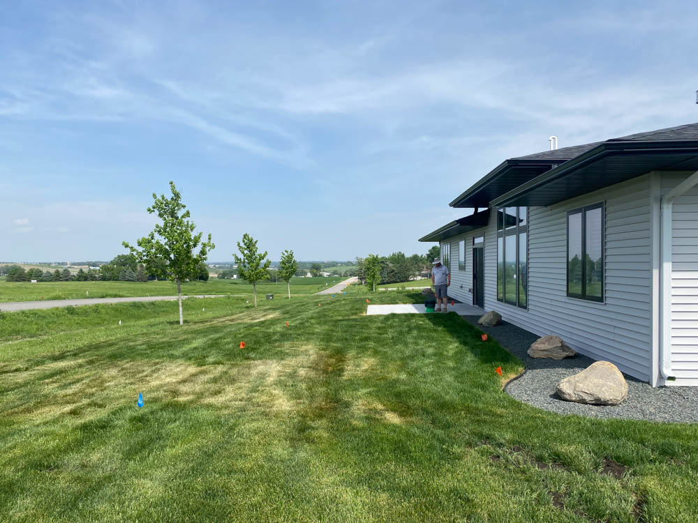 A Rochester, MN, empty backyard and lawn before landscaping