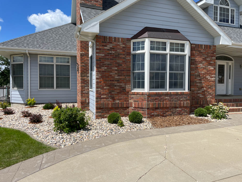 front of a midwest home with updated landscaping